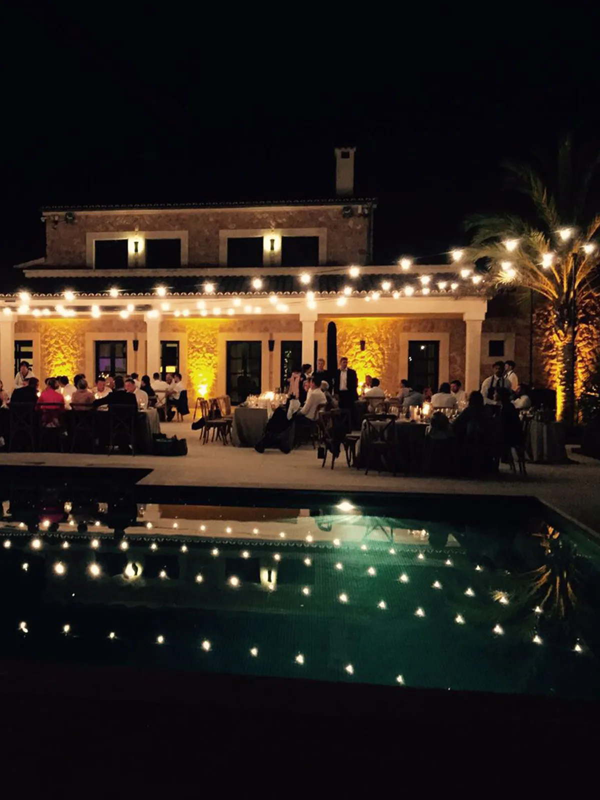 Poolside event lit by The Balearic Lighthouse