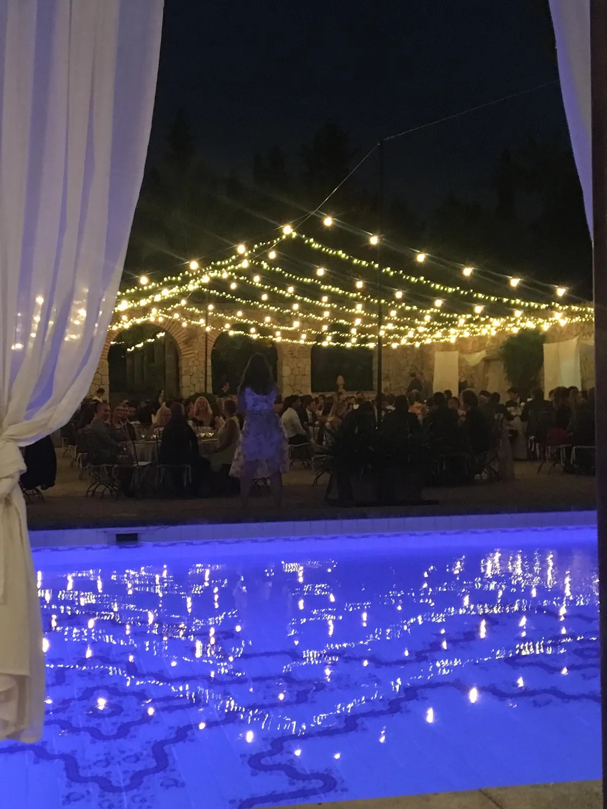 Poolside event lit by The Balearic Lighthouse