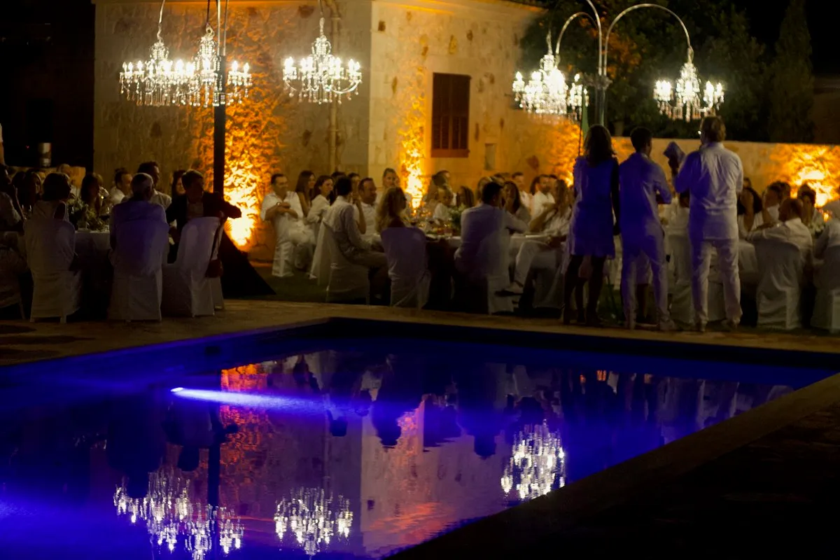 Poolside event lit by The Balearic Lighthouse